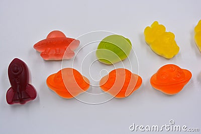 Sweet jelly candies, sweets in the form of aliens space rockets, astronauts, alien ships and planet, asteroids. Editorial Stock Photo