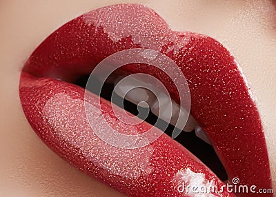 Sweet kiss. Close-up of woman's lips with fashion red make-up. Beautiful female mouth, full lips with perfect makeup Stock Photo