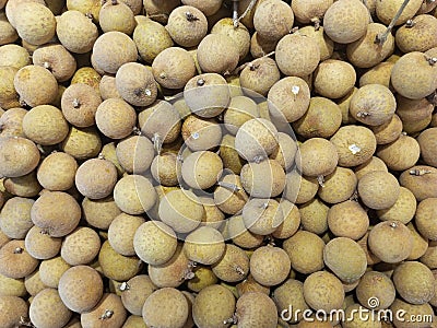 sweet longan fruit for sale in supermarket in the photo from above Stock Photo