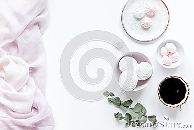 sweet marsh-mallow and flowers on woman white desk background top view mock up Stock Photo