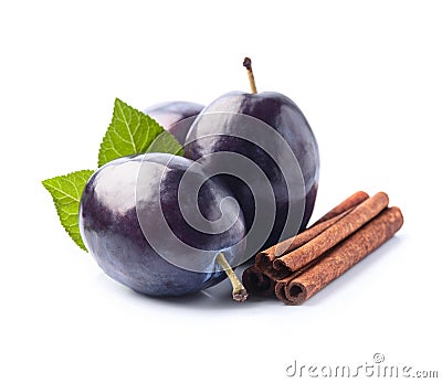 Sweet plums with cinnamon stick Stock Photo