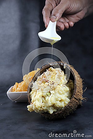 Sweet Pongal/sweet khichdi/coconut Khichdi Stock Photo