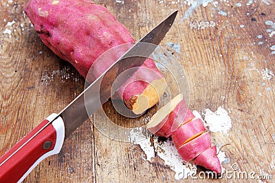 Sweet potato cutting Stock Photo