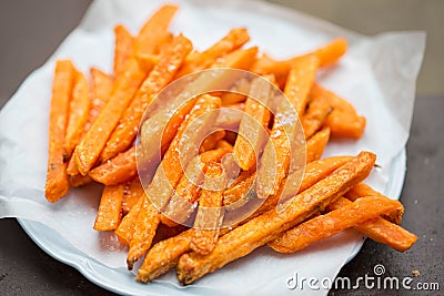 Sweet potato fries on plate Stock Photo