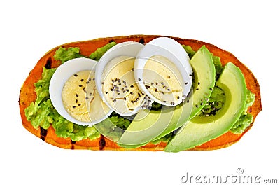 Sweet potato toast with avocado, eggs and chia seeds isolated Stock Photo