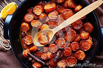 Sweet potatoes in a black ceramic dish Stock Photo