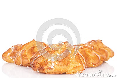 Sweet profiterole on white Stock Photo