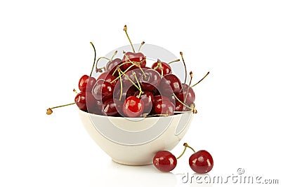 Sweet red cherries in ceramic bowl Stock Photo
