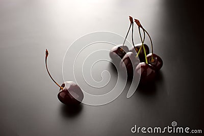 Sweet ripe cherries. Fresh cherry on black background. Farming abundance Stock Photo