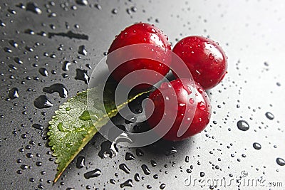 Sweet ripe cherries. Fresh cherry on black background. Farming abundance Stock Photo