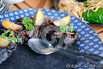 Sweet savory stewed pork & egg with chinese herb spices Stock Photo