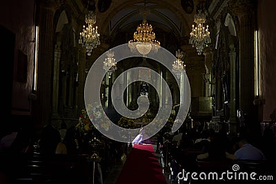 Sweet sixteen 16 ceremony at church with floor reflection Editorial Stock Photo