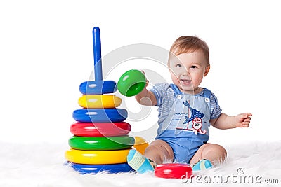 Sweet small baby with toy. Stock Photo