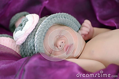 Sweet soft tenderness of innocent newborn baby sleeping Stock Photo