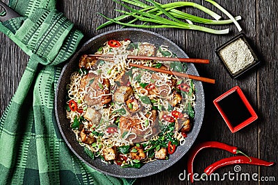 Sweet and sour tofu, chicken, and wok noodles Stock Photo