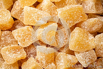 Sweet and spicy candied ginger background. Top view Stock Photo