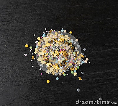 Sweet Sprinkles Isolated on Black Background Top View Stock Photo