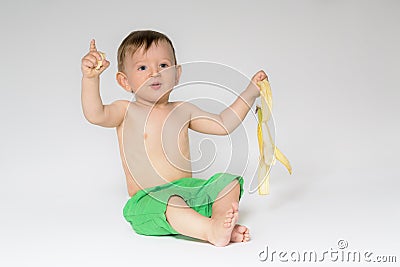 Sweet toddler with banana Stock Photo