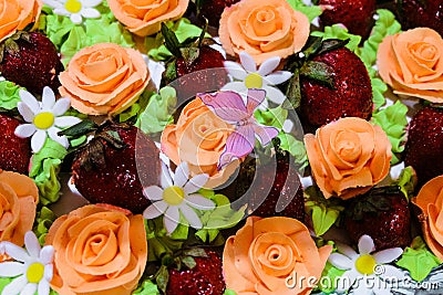 Sweet whipped cream orange roses, daisies and strawberry Stock Photo