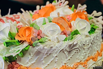 Sweet whipped cream orange and white roses Stock Photo