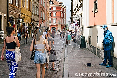 Swietojanska street is in Warsaw Old town and at one end connects to Old town square and then to castle square Editorial Stock Photo