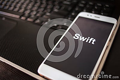 Swift Programming language for mobile development, concept. Smartphone Stock Photo