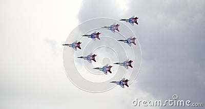 Demonstration flight of The Swifts (Strizhi), International aviation and space salon (MAKS). Editorial Stock Photo