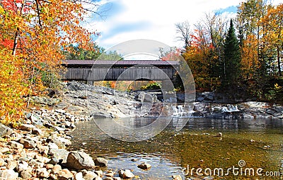 Covered bridge Ammonoosuc river in New Hampshire Stock Photo