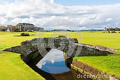The Swilcan Bridge, or Swilken Bridge, a famous small stone bridge spanning the Swilcan Burn in St Andrews Links golf course, Editorial Stock Photo