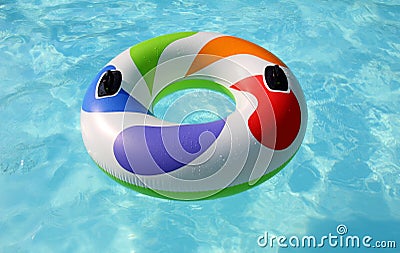 Swim ring in swimming pool Stock Photo