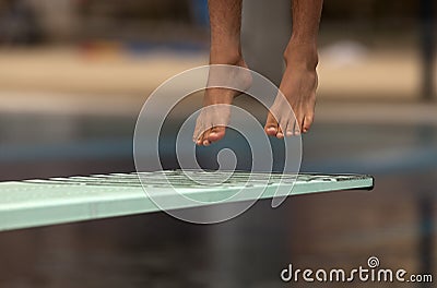 Swimmer launched into water Stock Photo