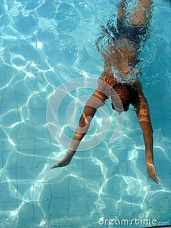 Swimmer at swimming pool Stock Photo