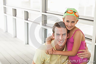 Swimming coach with cute little girl Stock Photo