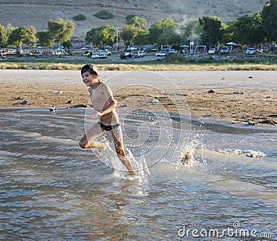 Swimming in lake Kinneret Stock Photo