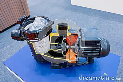 Swimming pool circulation pump with prefilter, coarse filter. Sectional view of the pump Stock Photo
