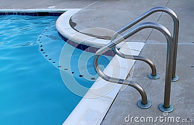 Swimming pool handrails Stock Photo