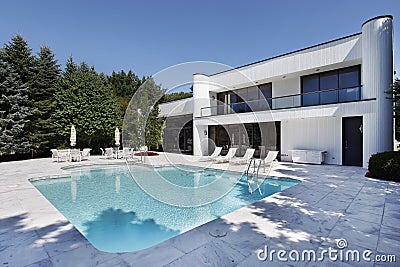 Swimming pool with large deck Stock Photo