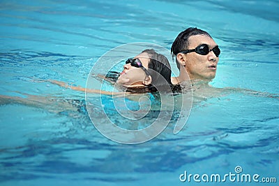 Swimming Pool Lifeguard Stock Photo