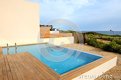 Swimming pool by luxury sea view villa Stock Photo