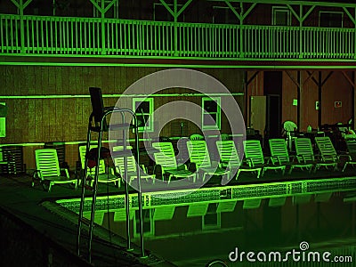 Swimming Pool At Night Eerie Green Stock Photo