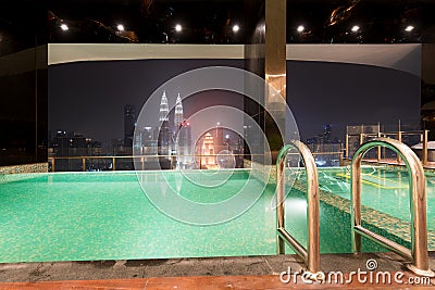 Swimming pool on roof top with beautiful city view Kuala lumpur, Malaysia Stock Photo