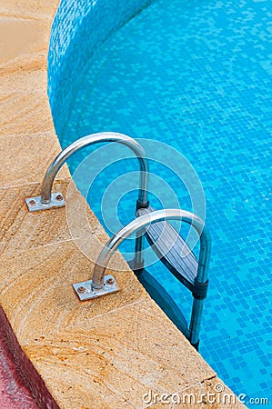 Swimming pool steps Stock Photo