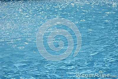 Swimming pool water sun reflection background. Ripple Water. Stock Photo