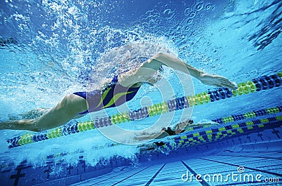 Swimming Team Practicing In Pool Stock Photo