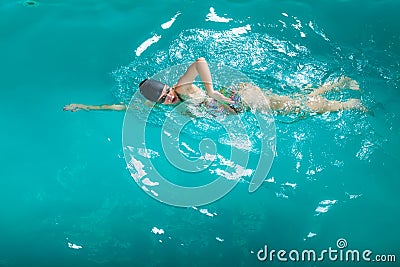 Swimming woman in pool. Stock Photo