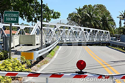 Swing bridge moves out of the way for a boat to get by. Stock Photo