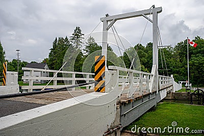 Swing bridge over canal lock Stock Photo