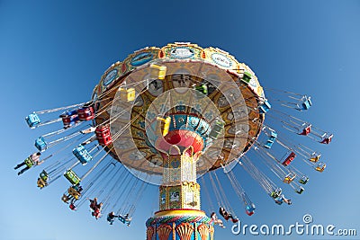 Swing rides at the amusement park Stock Photo