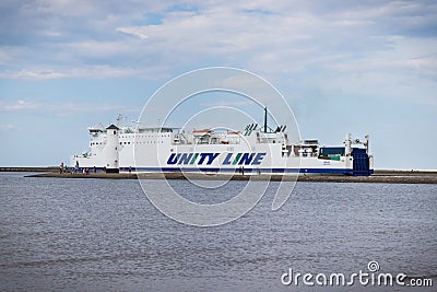 Swinoujscie, West Pomeranian - Poland - June 7, 2022: Wolin ferry leaving port of Swinoujscie and sailing to Ystad. Transport Editorial Stock Photo