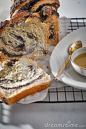 Swirl brioche with poppy seeds. Easter bread. Poppy seed braided or roll bread, Babka. Traditional Polish sweet Stock Photo